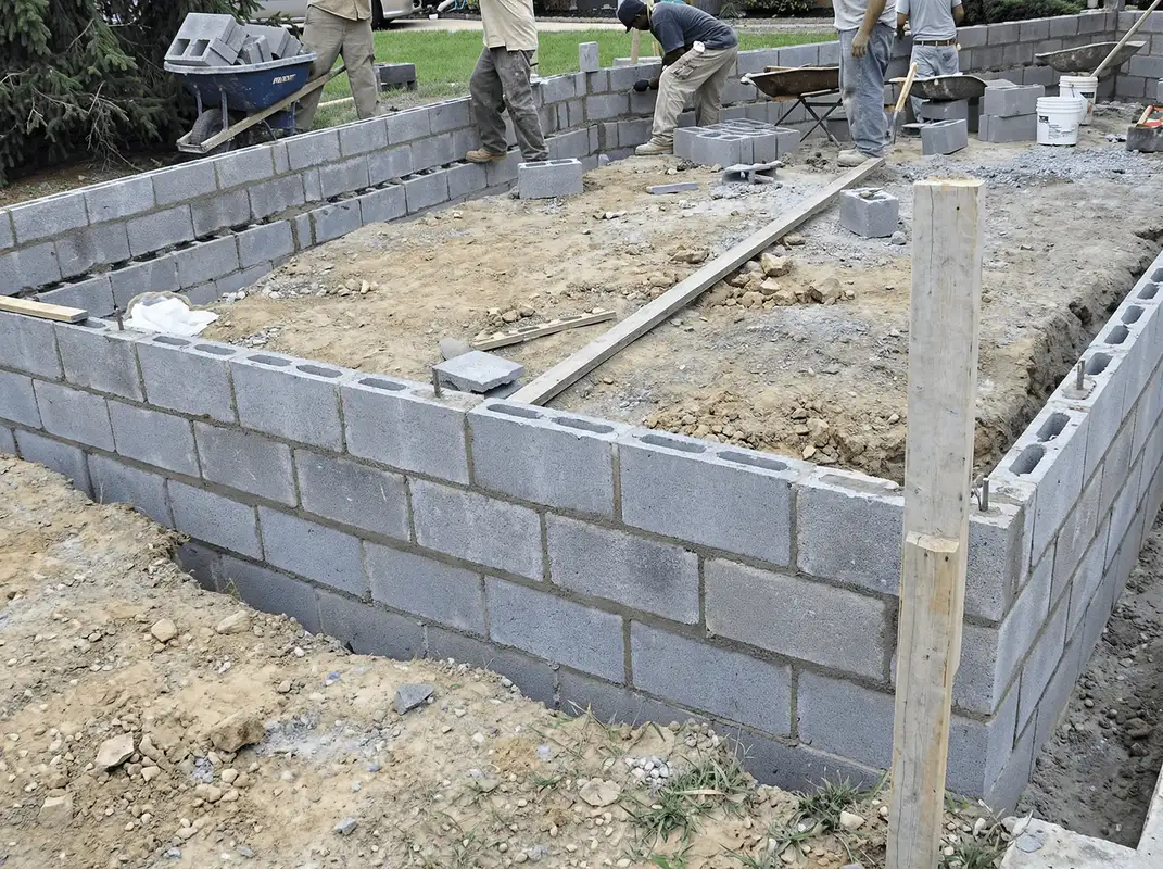 Professionals building a foundation with blocks in Detroit, MI
