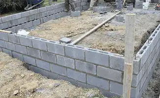 Professionals building a foundation with blocks in Detroit, MI