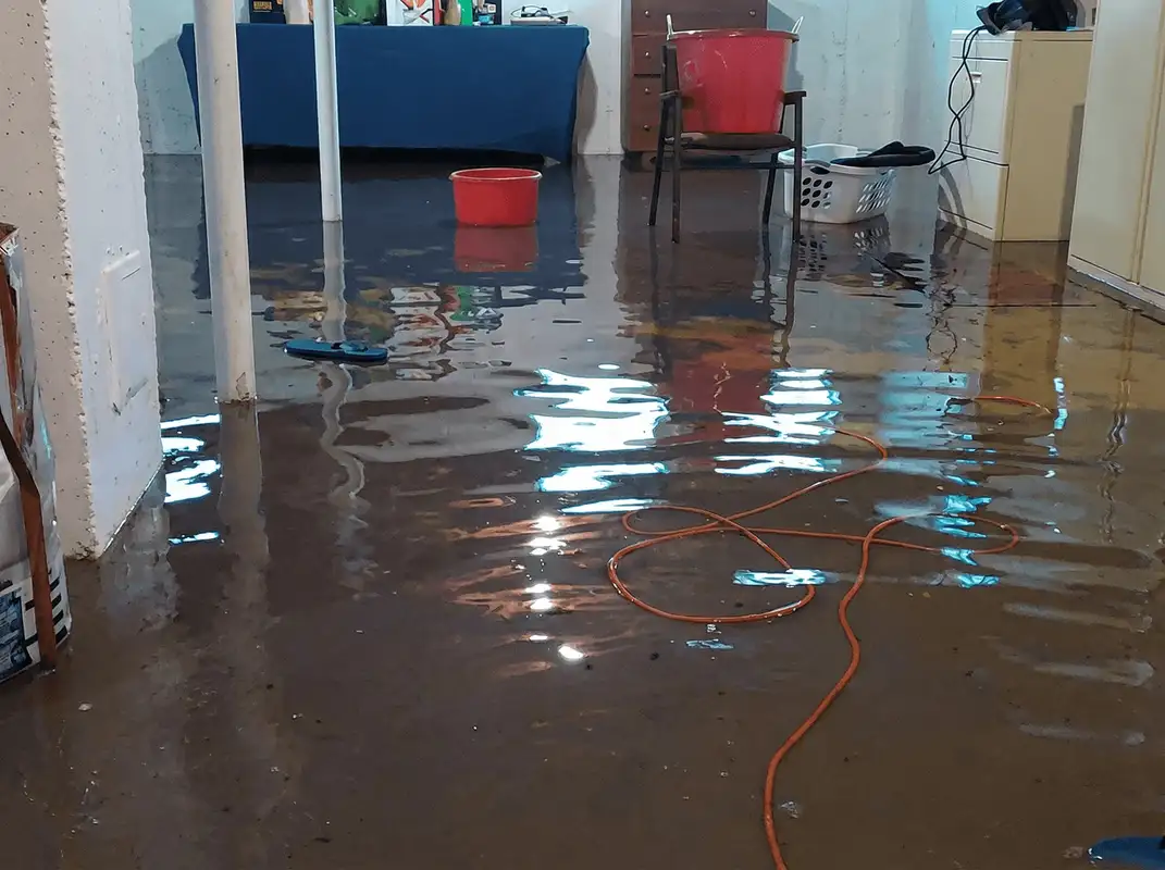 Basement with boiler, cabinets and washing machine completely flooded in Detroit, MI